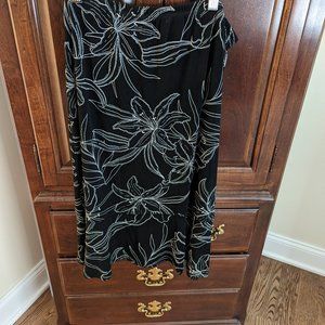 Chicos Travelers Skirt, Size 2 based on Chico's sizing, black background color